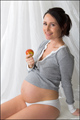 Pregnant Woman with Healthy Apple